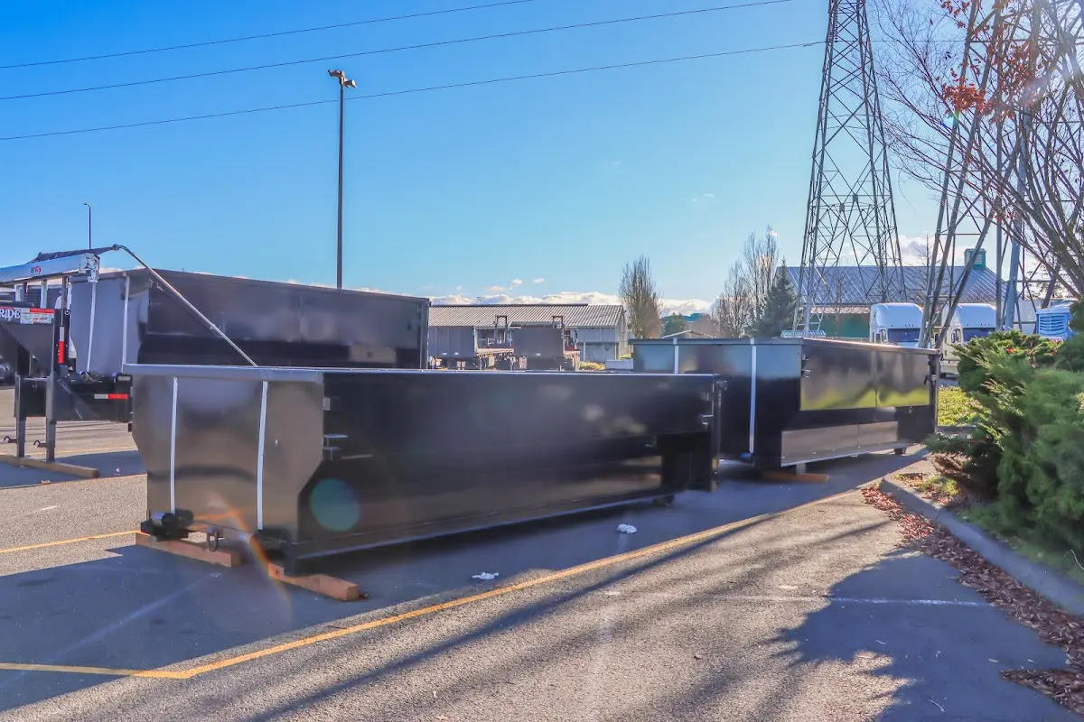 Roll-off dumpster ready for waste disposal at job site for 4 Yard Dumpster Rental in Osceola